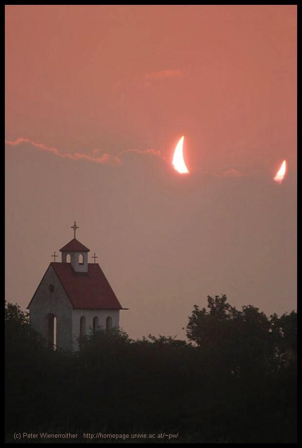 partial-solar-eclipse-devil-horns-sun-Peter-Wienerroither-.jpg